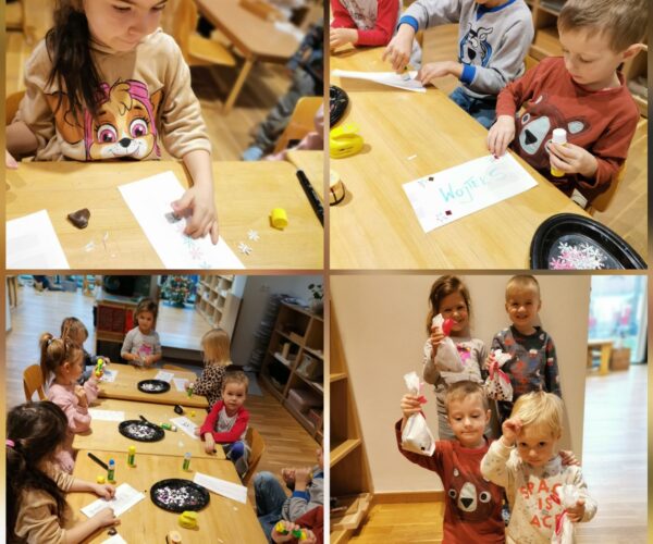 Eltern und ihre Kinder bei der gemeinsamen Arbeit an Montessori-Materialien in unserem Kindergarten.